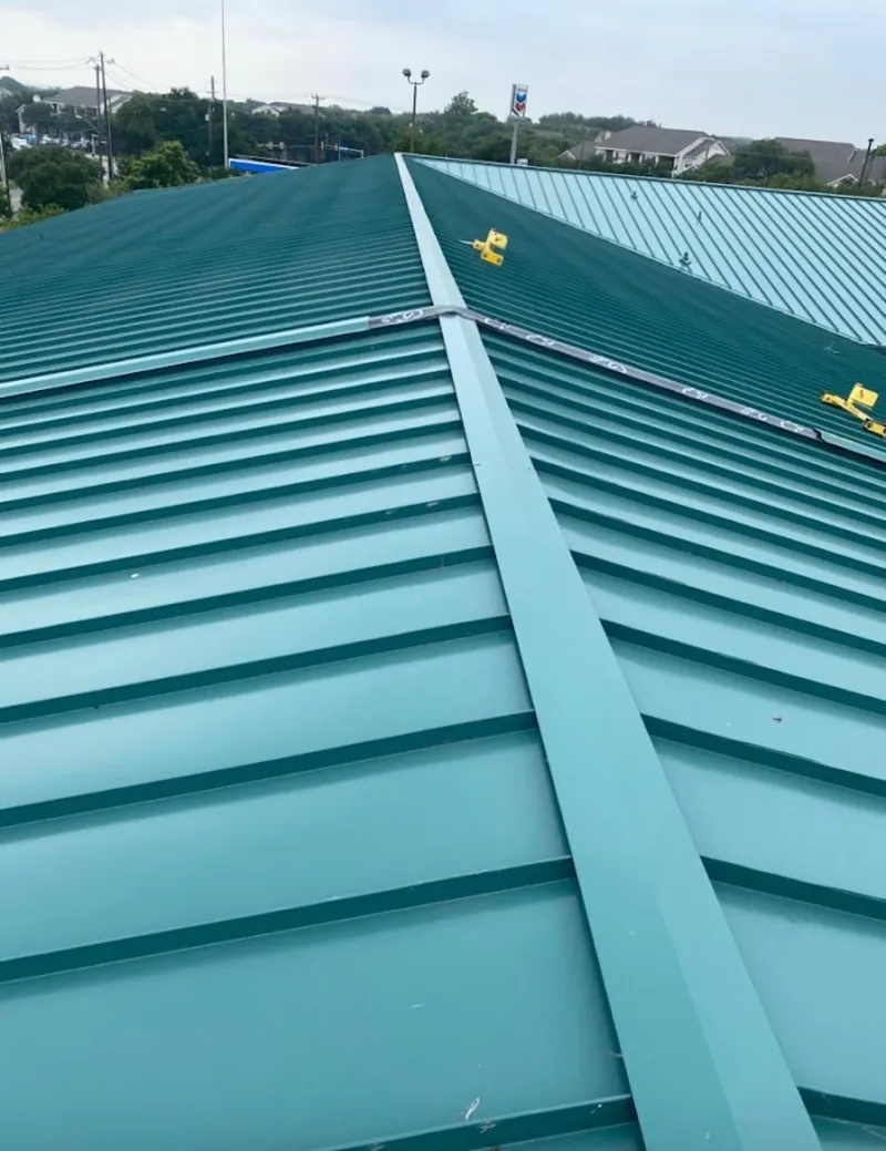 Green commercial metal roof ridge and valley for Metal Roof Repair in Colonial Heights